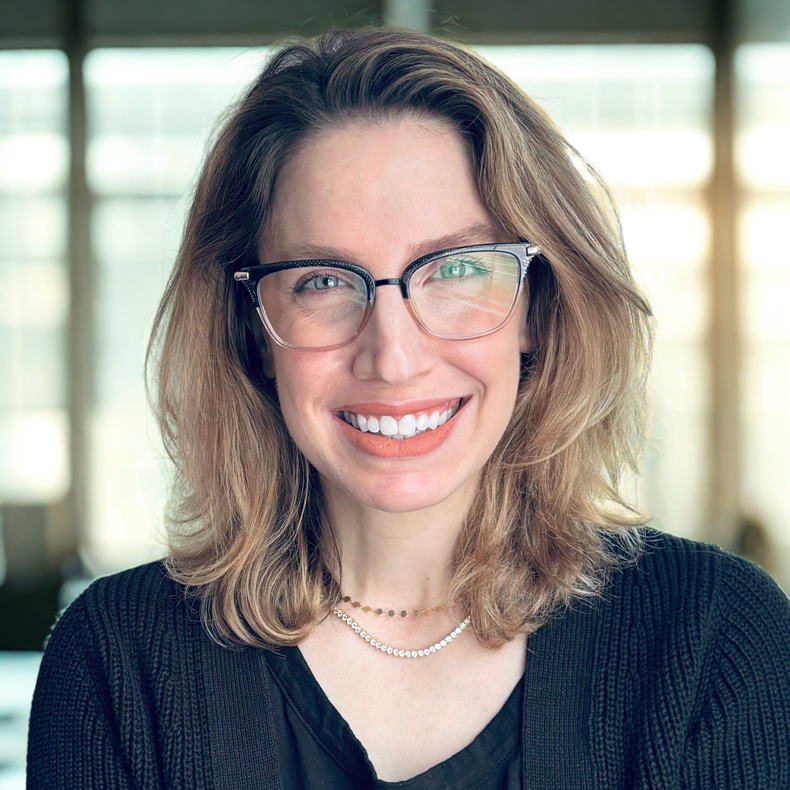Portrait photo of woman smiling in glasses