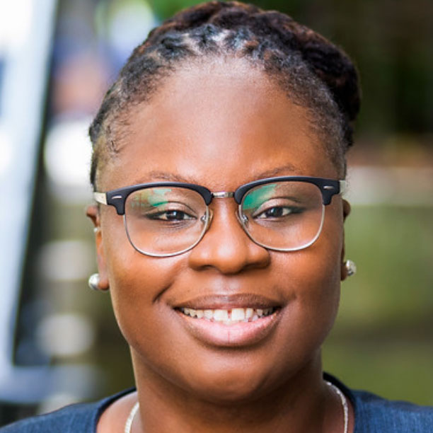 Close up portrait photo of black woman wearing glasses