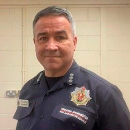 portrait photo of man in fireman uniform