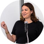 circular photo of woman speaking at a podium