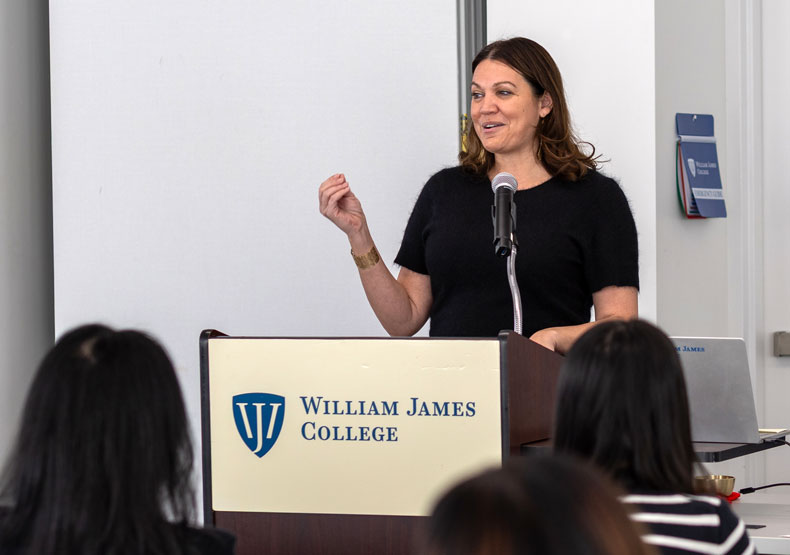 woman standing at podium