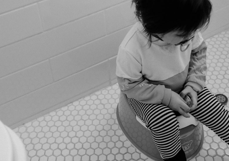 child and toilet